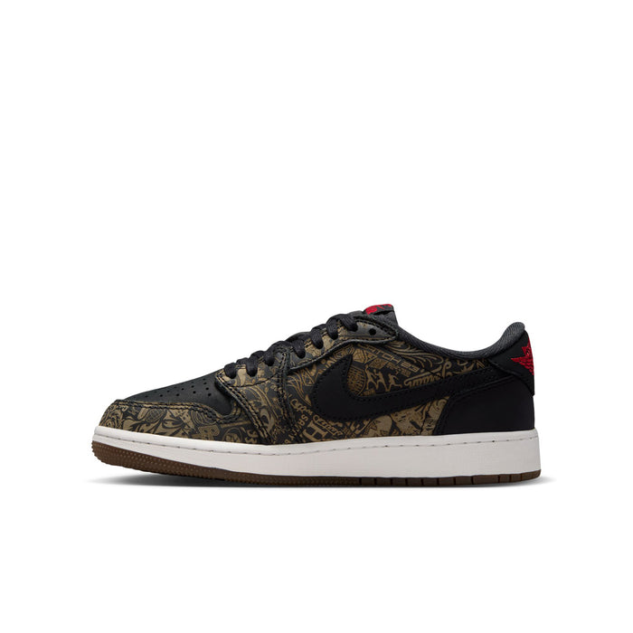 Youth low-top sneakers, front three-quarter view; black and gold patterned upper, red details