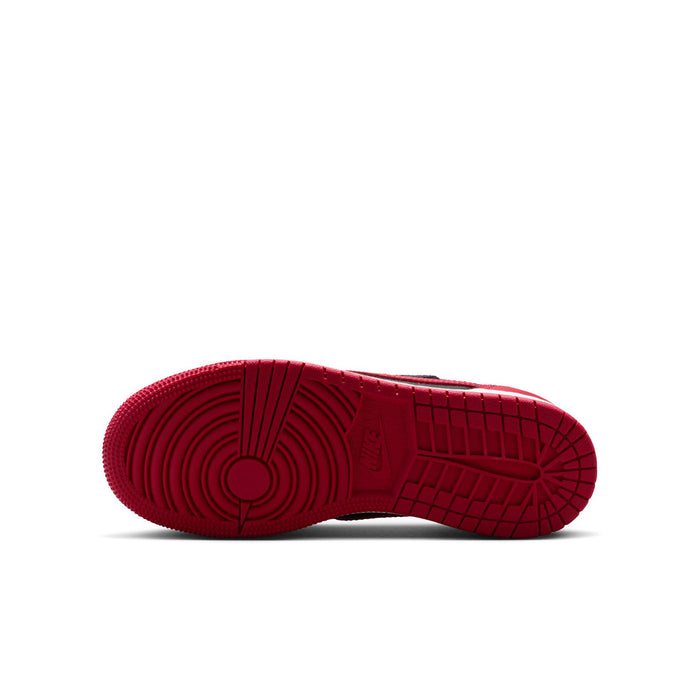 Youth sneaker outsole view in dark red with tread and grid pattern