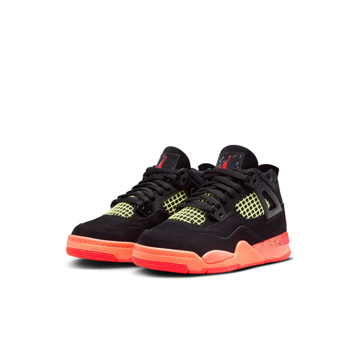 Kids retro 4 sneakers, black upper with neon green grid accents and bright red outsole