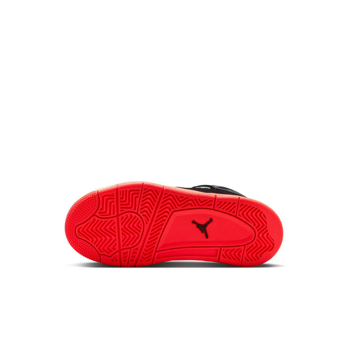Kids retro 4 outsole view, red rubber tread with Jordan Jumpman logo