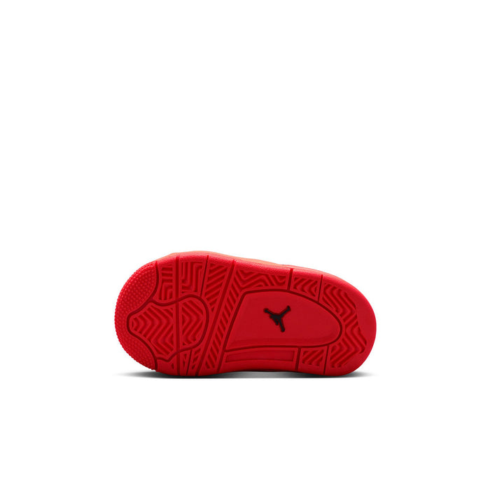 Toddler red outsole with traction pattern and black Jumpman logo, bottom view