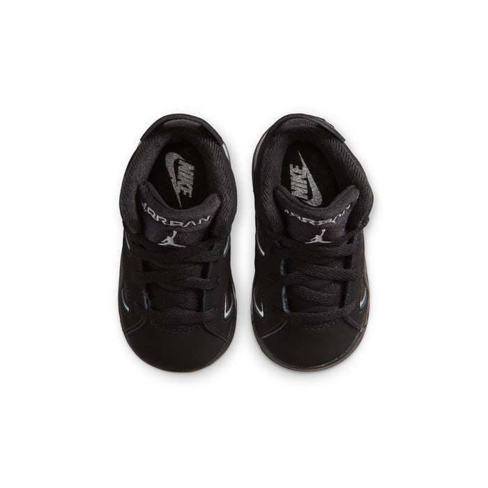 Black toddler sneakers shown from the front with lace-up and logo on the tongue lining