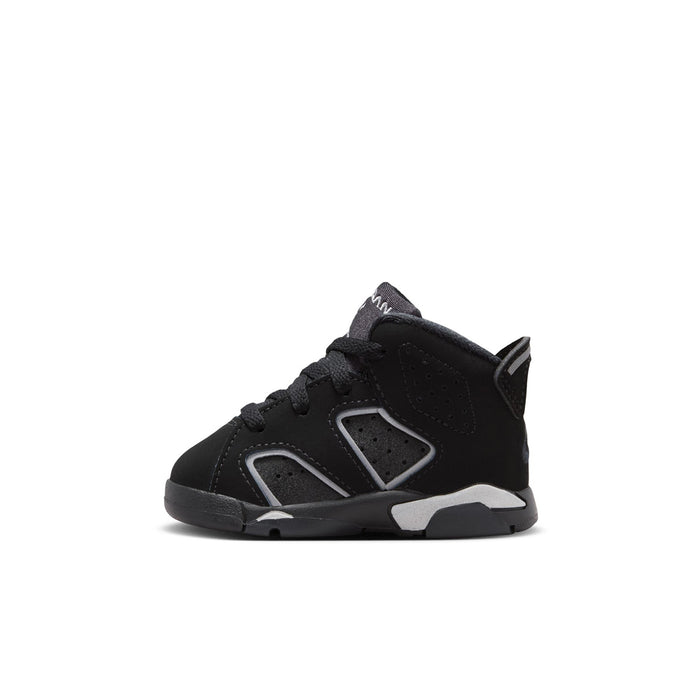 Black toddler sneaker side view with lace-up, perforated panel accents, and chunky sole