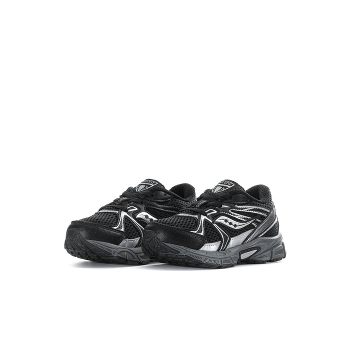 Black toddler sneakers with white chevron overlays and chunky protective toe caps