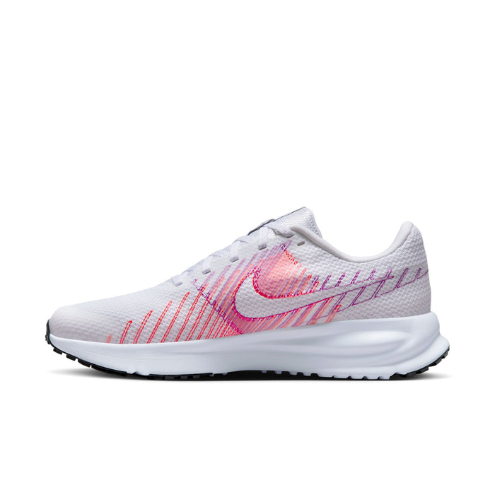 Women’s running shoe side angle: white upper with bright pink swoosh and line pattern, foam sole.