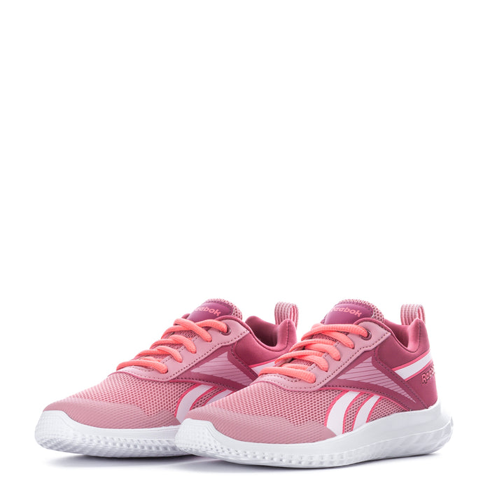 Pair of kids pink running sneakers with white midsole and lace-up closure
