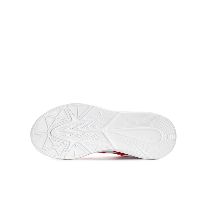 Youth shoe outsole with textured tread, white rubber base with red edge