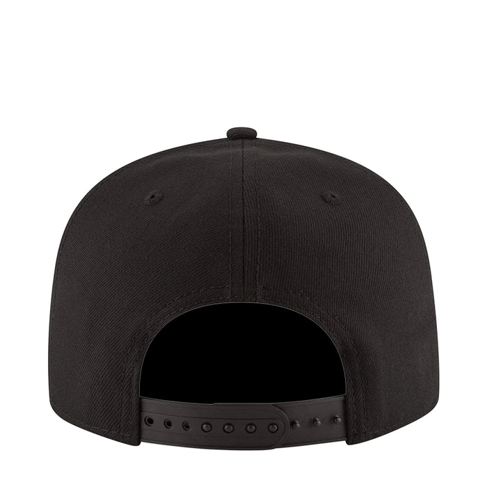 Black snapback cap with adjustable back strap and curved brim