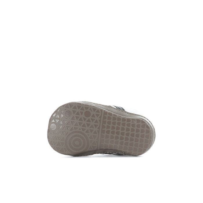 Infant adidas Samba sneaker outsole with textured rubber tread pattern