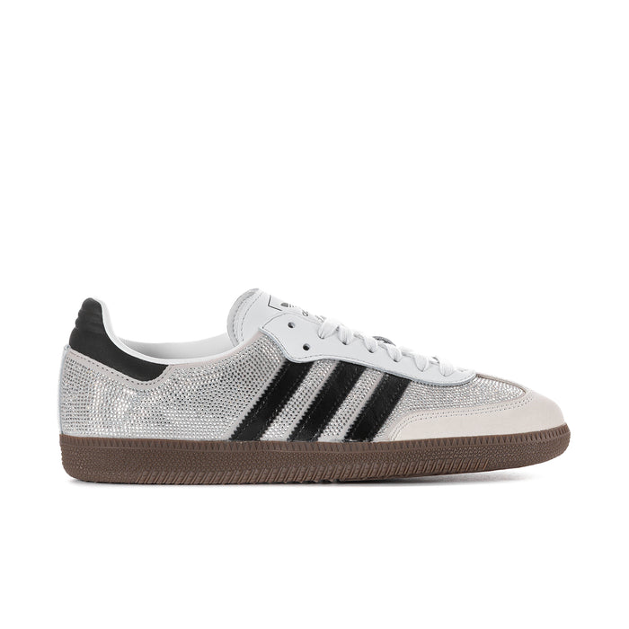 Rhinestone-embellished low-top sneakers with black stripes and gum sole