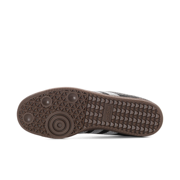 Outsole view of gum rubber adidas Samba OG women’s sneakers with tread pattern