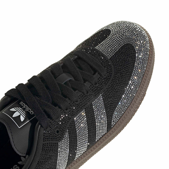 Detail of black lace-up adidas Samba OG women’s sneaker with rhinestone upper