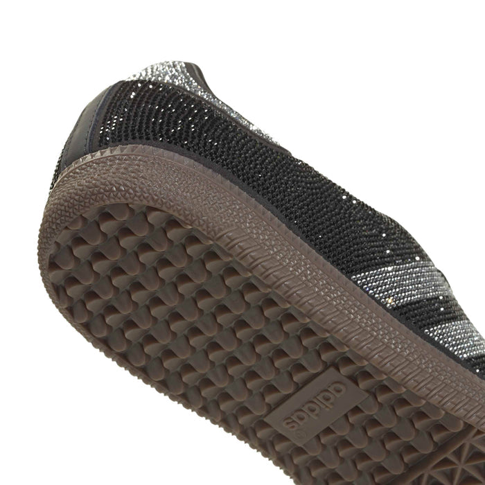 Side outsole detail of gum rubber adidas Samba OG women’s sneaker with textured tread