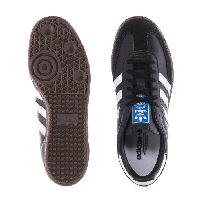 Kids' sneaker outsole view with gum rubber tread and adidas logo