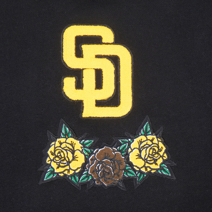 Close-up: yellow SD logo with colorful roses on a black hoodie