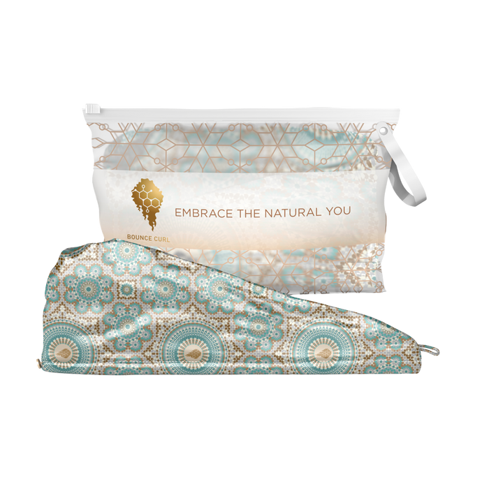 Bounce Curl Satin Microfiber Turban with teal and gold details and a packaged turban in the background
