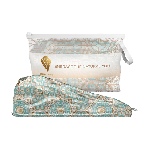 Bounce Curl Satin Microfiber Turban with teal and gold details and a packaged turban in the background