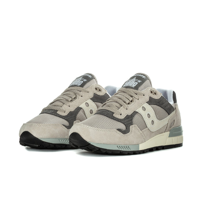 Men's lace-up running sneakers, beige upper with dark gray overlays and teal midsole