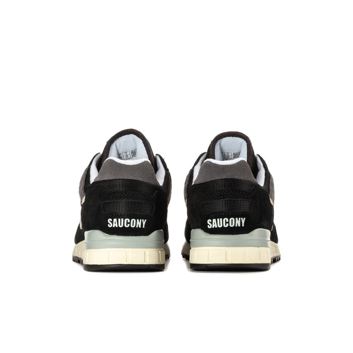 Men's Saucony Shadow 5000 sneakers, heel view pair, black with white Saucony branding.