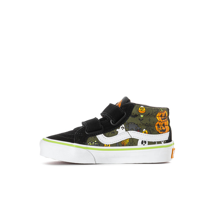Kids mid-top sneakers angled view, black upper with pumpkin and ghost print, Velcro strap.