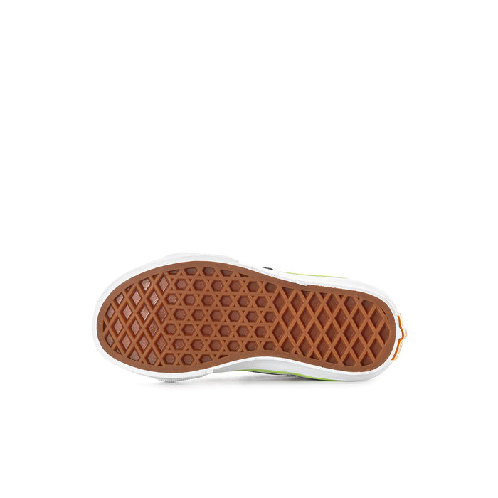 Kids sneaker outsole view, brown grippy tread with white edge and green line.