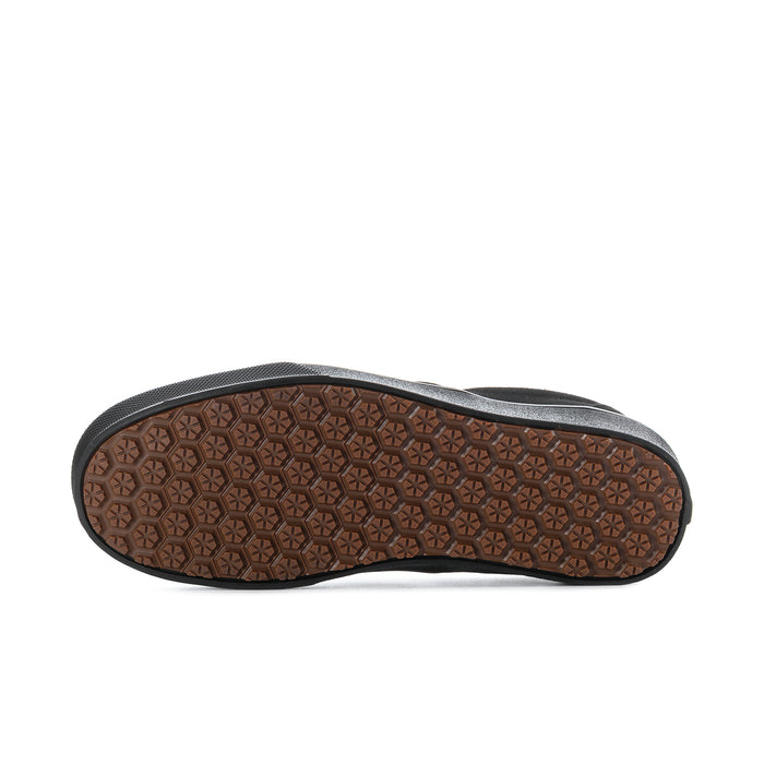 Black slip-on sneaker outsole with brown gum tread pattern
