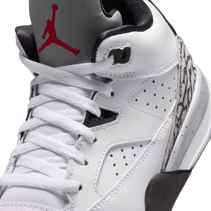 Kids high-top shoe close-up: white upper with red Jumpman on grey tongue.