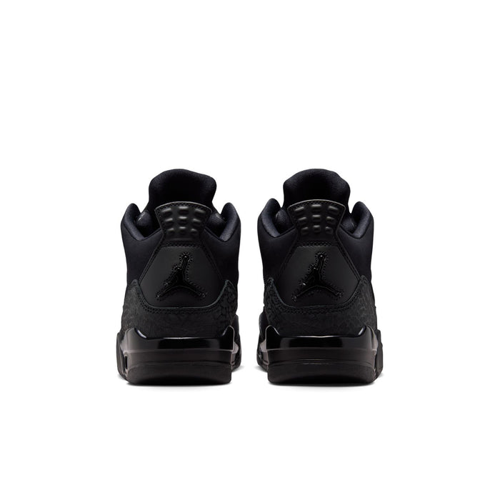 Black youth basketball shoes, back view with heel overlays and stacked sole