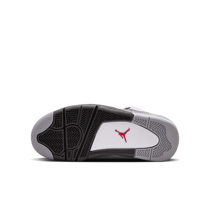 Youth sneaker outsole with black tread pattern and red Jumpman logo on gray base