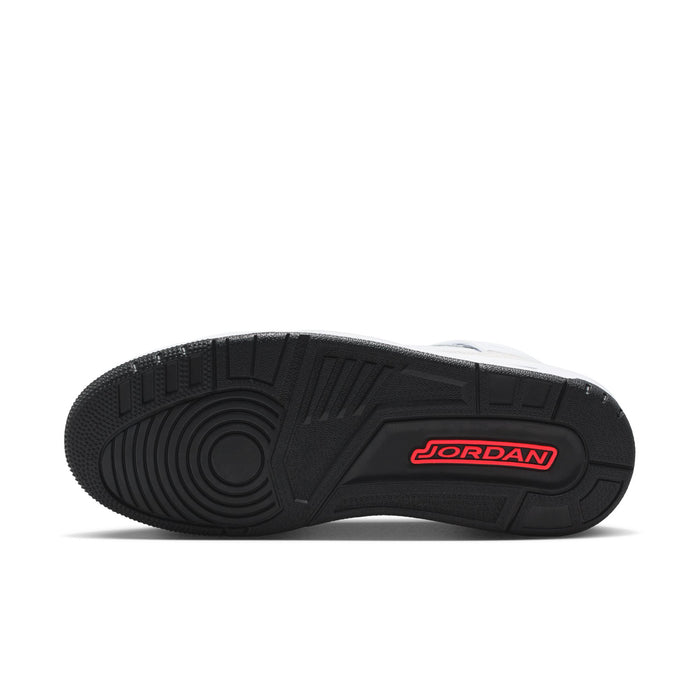 Black rubber outsole with textured tread and red Jordan branding on heel