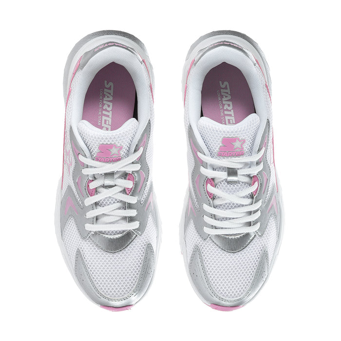 White women's sneaker showing pink interior lining, lace-up eyelets, star detail