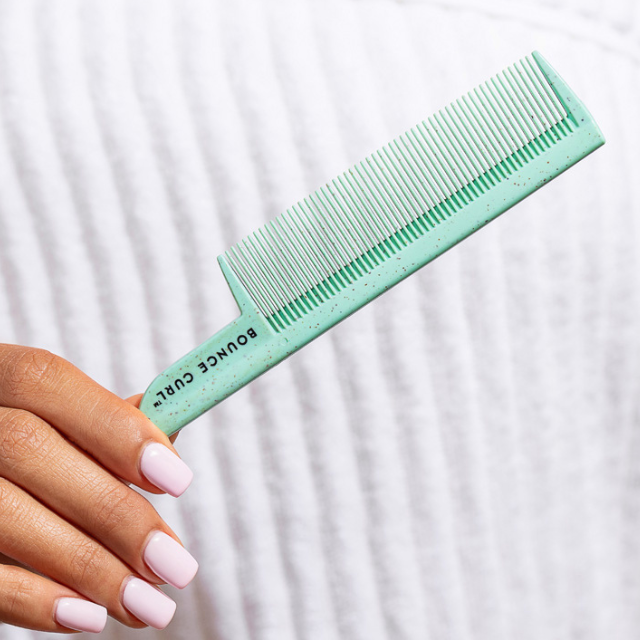 Bounce Curl Teal Styling Comb for curly hair on a white background