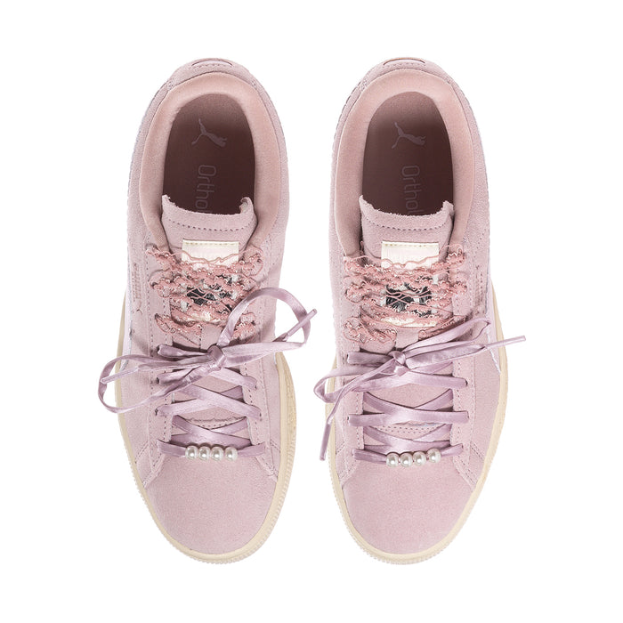 Women’s pink suede sneakers, lace-up front with pearl-like bead accents and padded collar