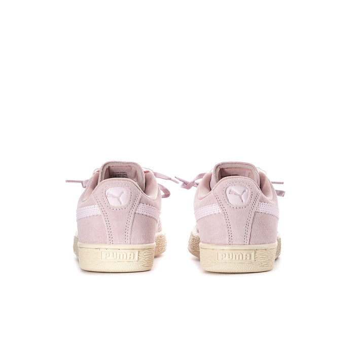 Women’s pink suede sneakers from heel view with cream rubber sole and side Puma-style logo