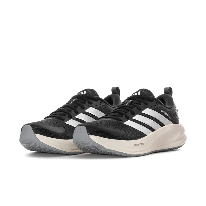 Women's black running shoes with white stripes and gray/cream rubber sole