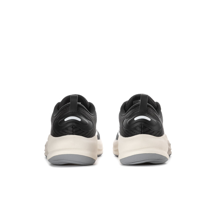 Women's black running shoes with white midsole and padded heel tab