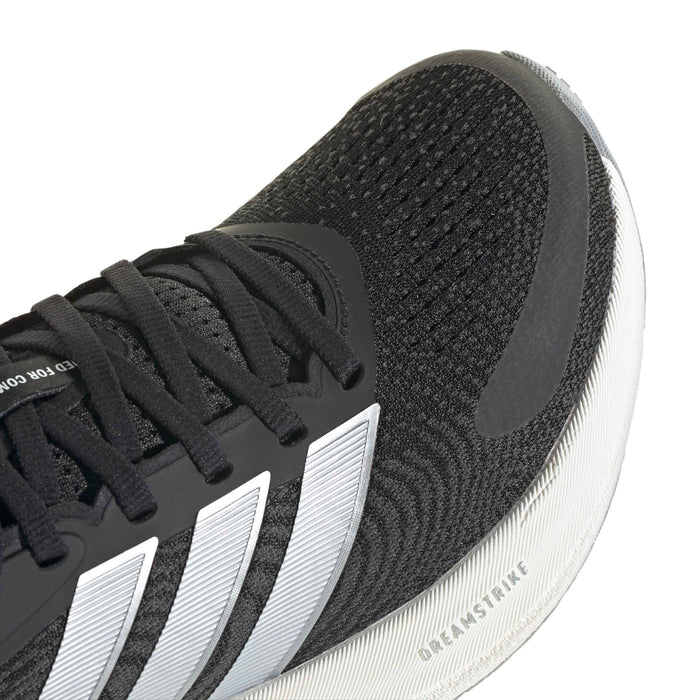 Women's black textured knit upper with white three stripes and black laces