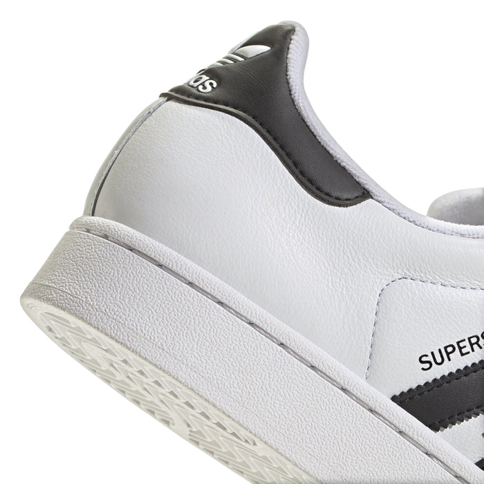 Side close-up of men's adidas Superstar II sneaker in white leather with black heel patch