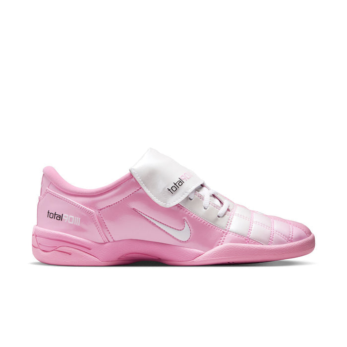 Pink and white women's sneakers with Nike swoosh and lace-up closure