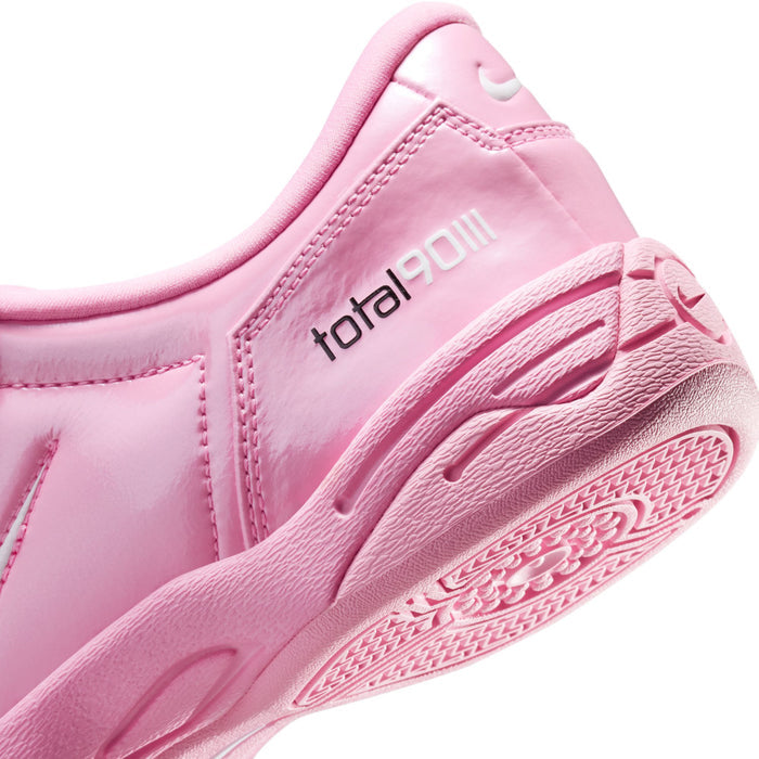Pink women's sneaker with total90ii logo on side and ridged sole