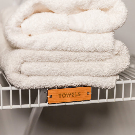 Tie-On Labels for Closet Organization - Cherry Wood Towels on ventilated wire shelving - by LeeMo Designs in Bend, Oregon