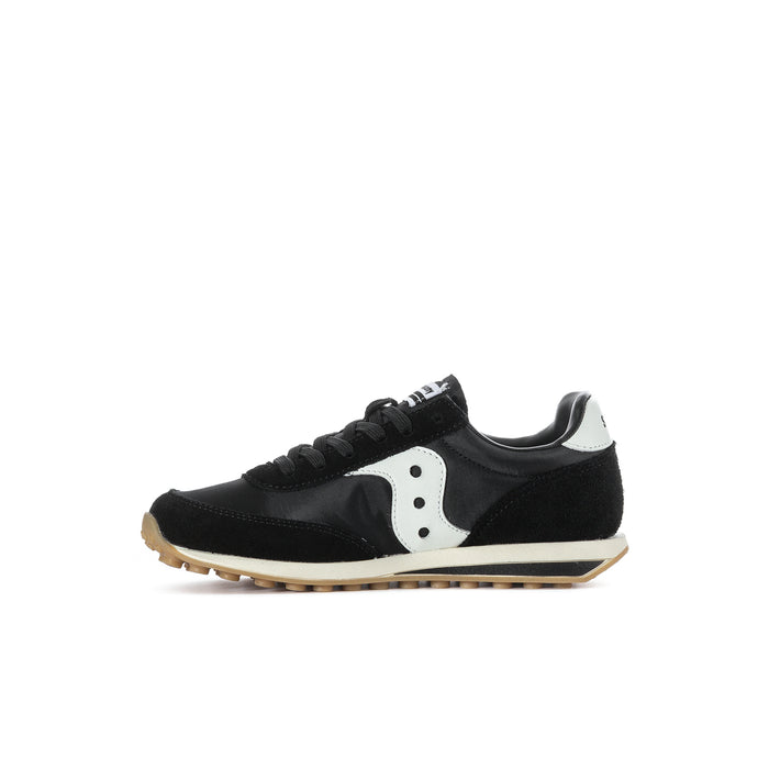 Kids black Saucony sneakers, angled side view, white side panel and gum sole