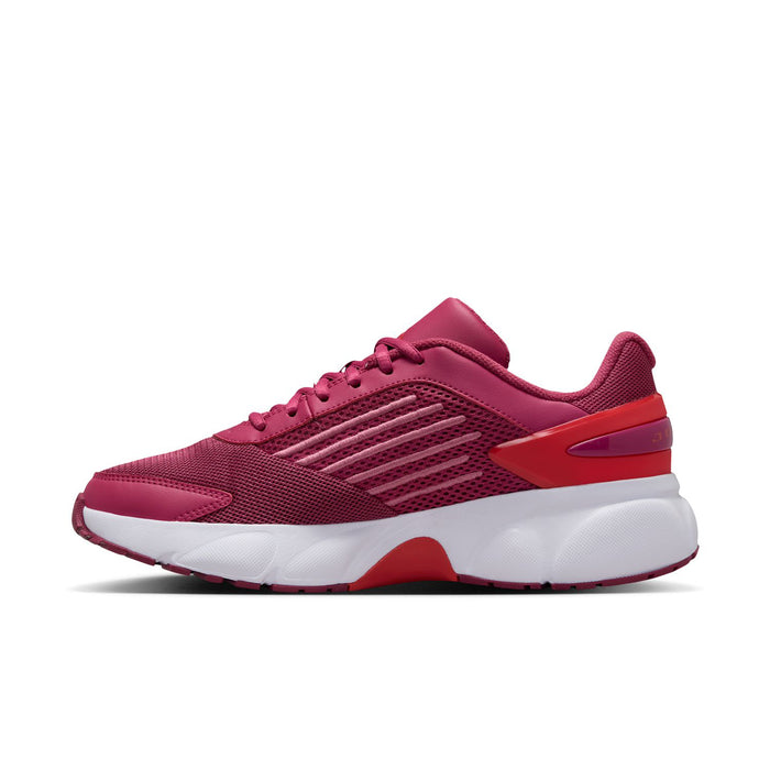 Women’s berry pink low-top running shoes with mesh upper, laces, and red heel panel
