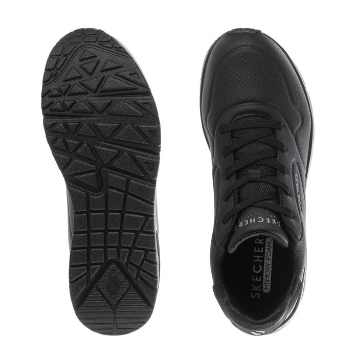 Black SKECHERS sneaker outsole tread and heel view with lace-up upper