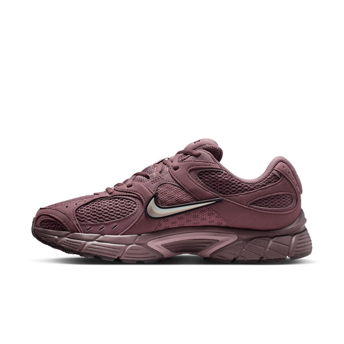 Men's athletic sneakers, dusty mauve, side profile with NIKE swoosh and ridged sole