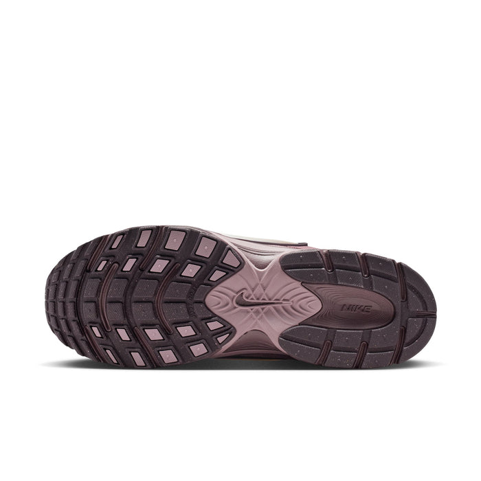 Men's athletic sneakers outsole view with grippy tread pattern in mauve and dark accents