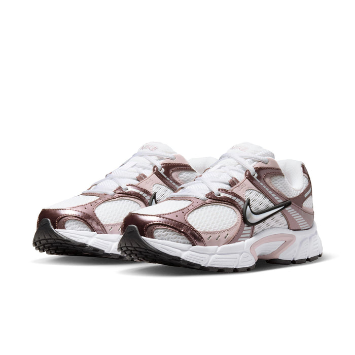 Women’s running sneakers, side view, white mesh with rose and brown leather overlays