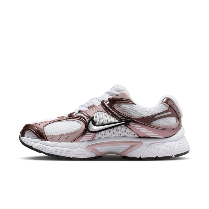 Women’s running sneakers, angled side view, white base with rose and brown accents
