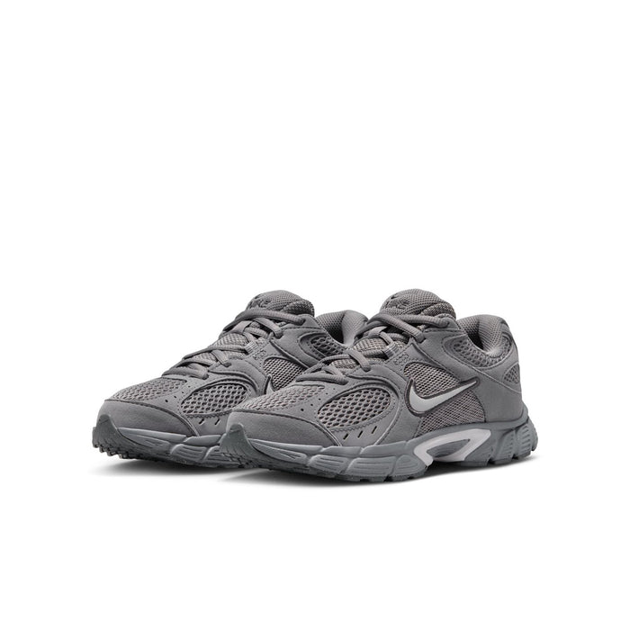 Youth lace-up running shoes in dark gray with layered overlays and cushioned sole