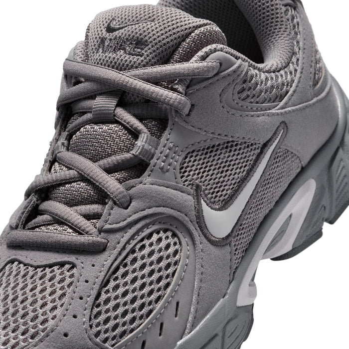 Close-up of youth dark gray sneaker upper with laces, mesh, and molded overlay details